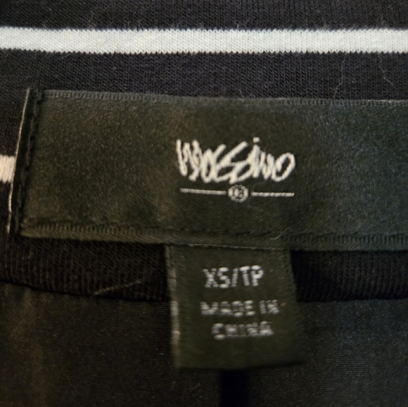 Cute black zip-up jacket with white stripes. Good condition. Size extra small. - Picture 3 of 4